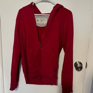 Champion red zip up hoodie with pockets size M medium